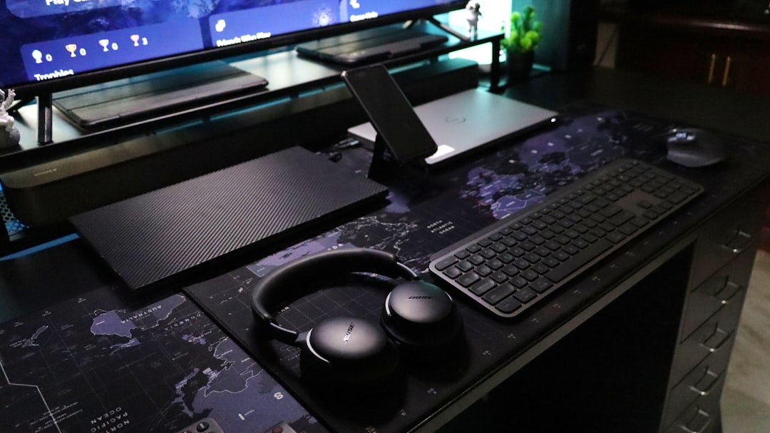 A computer desk with a keyboard and mouse